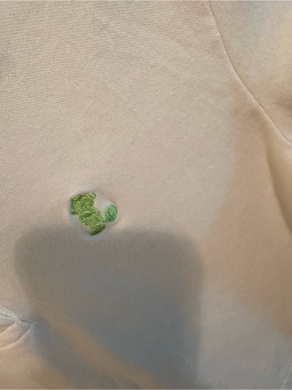 Disney women’s White Polo Shirt with Green Crest - size Small - Picture 3 of 13
